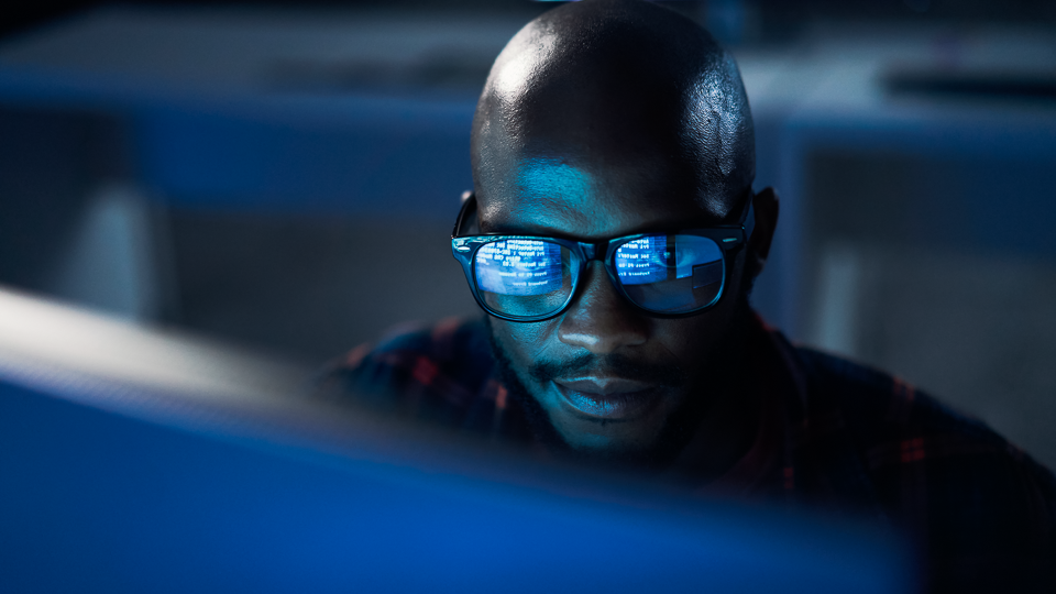 man working on computer