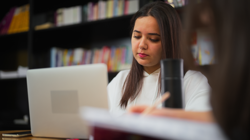 Paralegal Student using a laptop