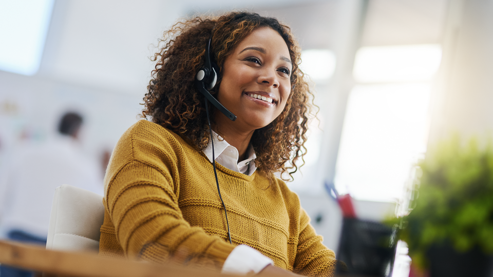 Sales Specialist on headset phone