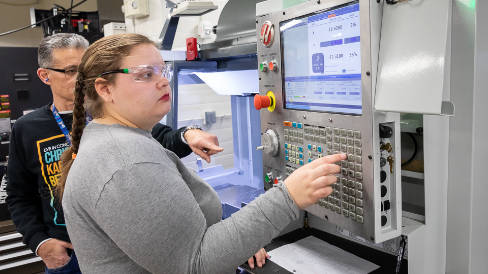 UAA student Siri Reichelt at work in MATC's CNC lab.