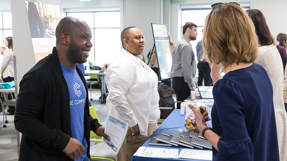 MATC staff talking to visitors
