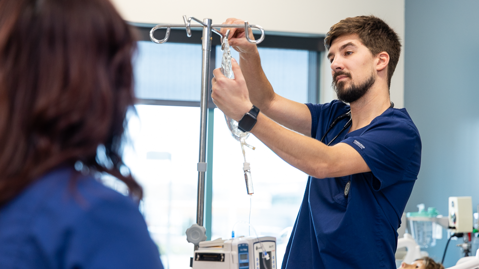 registered nursing students working in the field at hospital