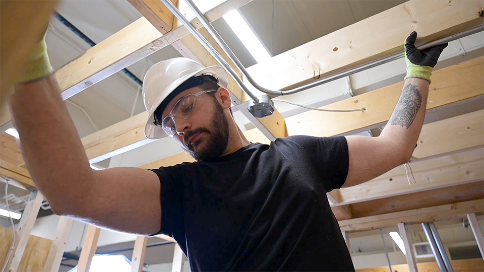 man working on electrical equipment