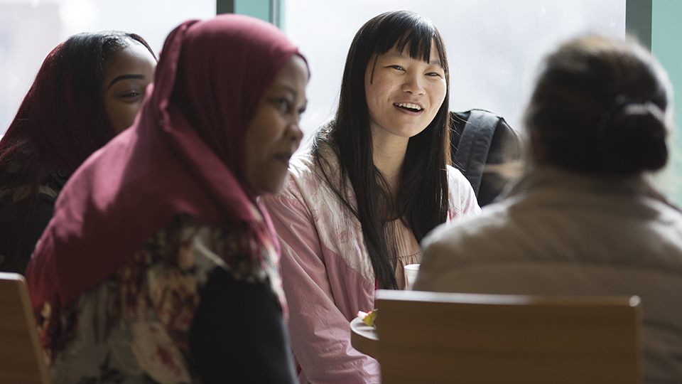 diverse group of students in conversation