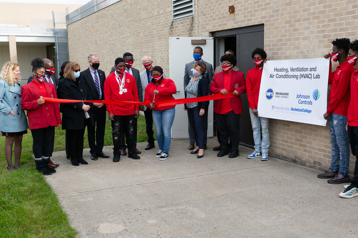 Students, educators and partners cut the ribbon on the new HVAC lab