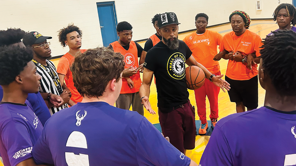 Nigel teaching basketball