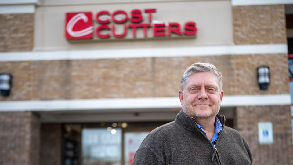 Dave Hagemeier in front of Cost Cutters photo