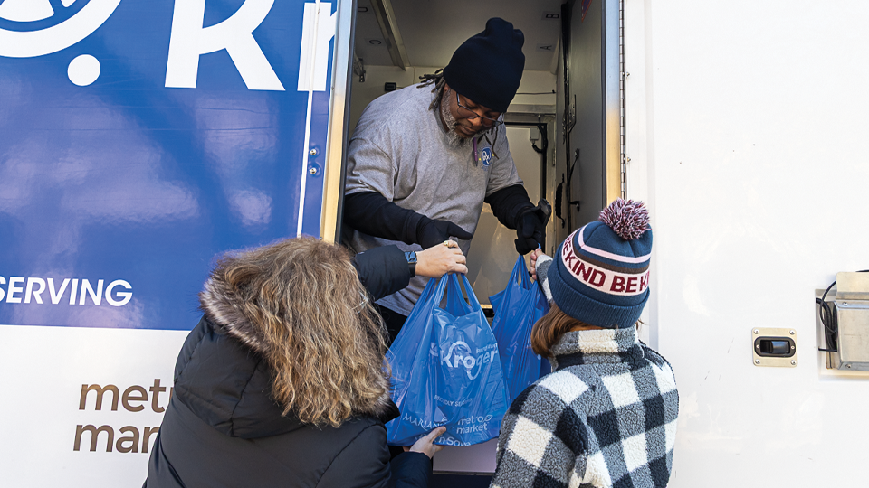 Handing out bags