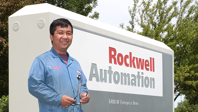 Chai Chang in front of Rockwell Automation pic