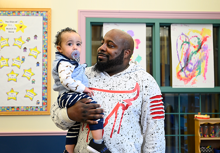 Father with child at MATC Children's Center photo