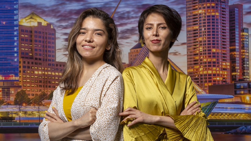 Fatema Watandost and Nikbakht Dadfar at the C building in Downtown Milwaukee Campus