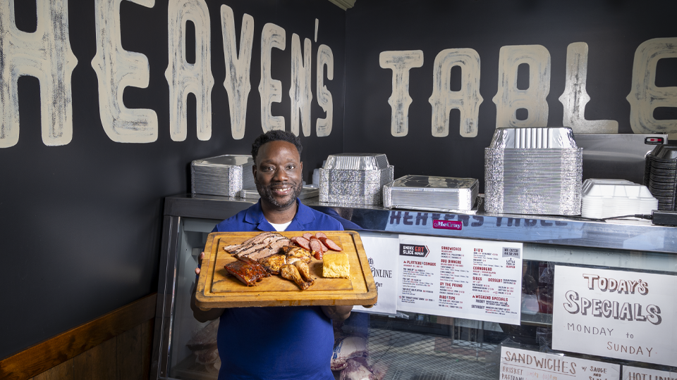 Jason Alston serves up savory specialties at Heaven's Table BBQ