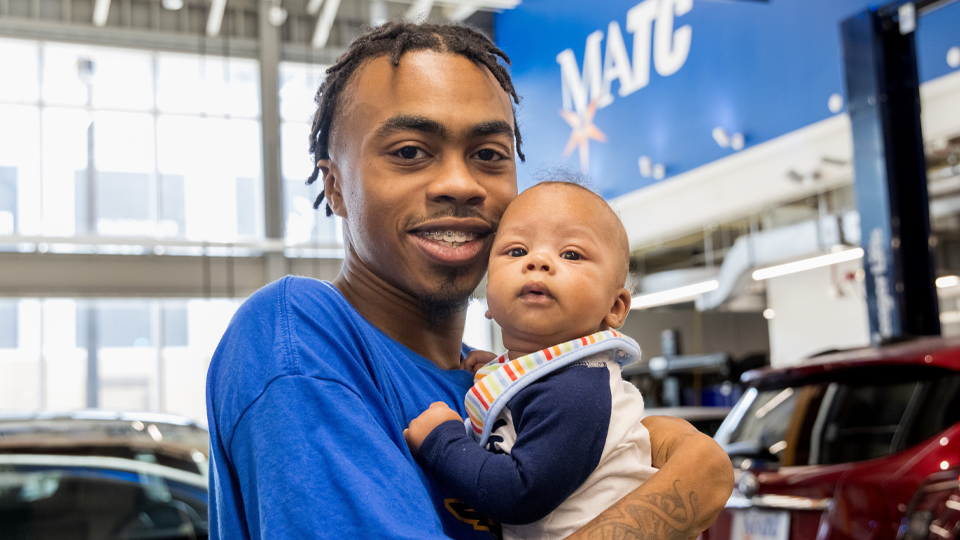 Martin Kennedy and his child